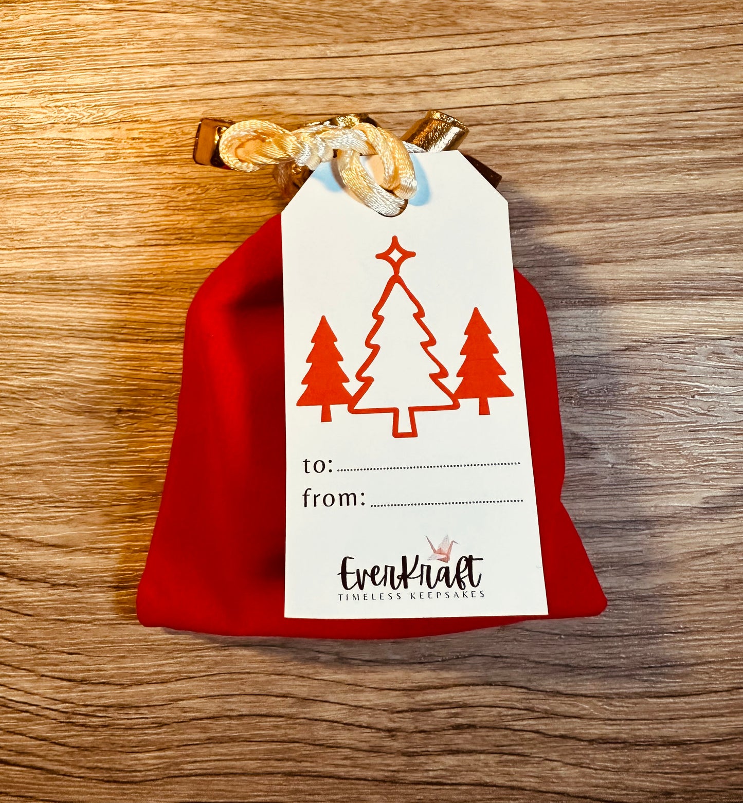 Red and gold pouch with tag